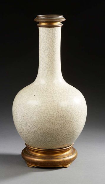 CHINE Porcelain bottle vase with a creamy grey crackled base 19th century Mounted...