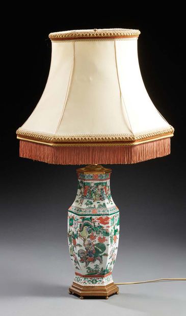 CHINE A porcelain vase decorated in green family enamels with warriors, mounted as...