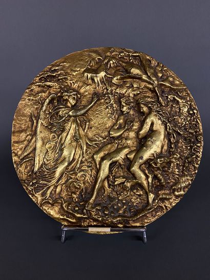 null Plaque circulaire en bronze à patine dorée figurant Adam et Eve

Vers 1900

Diam....