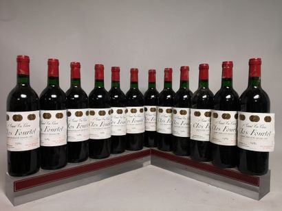 null 12 bouteilles CLOS FOURTET - 1er Gcc Saint Emilion En caisse bois 1986

Etiquettes...