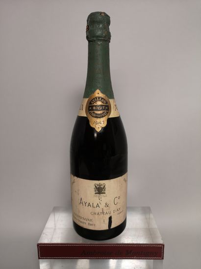 null 
1 bouteille CHAMPAGNE - AYALA ""Extra Quality Brut"" 1947
Etiquette légèrement...