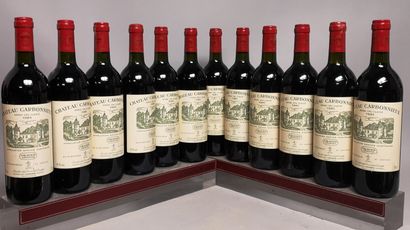 null 12 bouteilles Château CARBONNIEUX - Gcc Pessac Leognan En caisse bois. 1985

11...