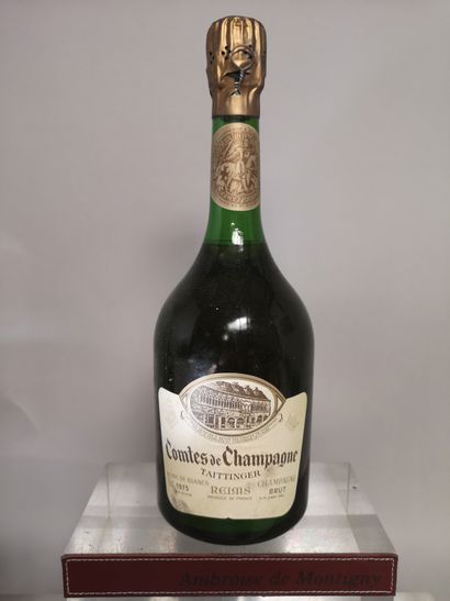 null 
1 bouteille CHAMPAGNE TAITTINGER Comtes de CHAMPAGNE ""Blanc de Blancs"" 1973
Etiquette...