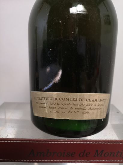 null 
1 bouteille CHAMPAGNE TAITTINGER Comtes de CHAMPAGNE ""Blanc de Blancs"" 1973
Etiquette...