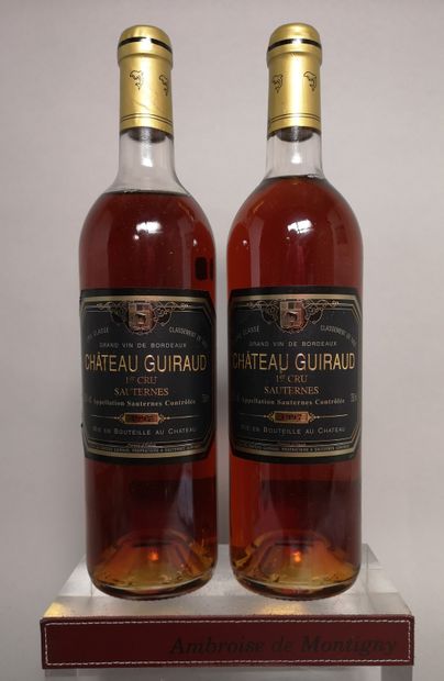 null 
2 bouteilles Château GUIRAUD - 1er Gcc Sauternes 1997
1 niveau légèrement bas...