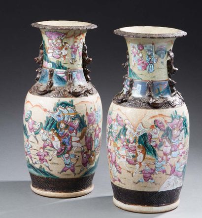 CHINE Pair of porcelain vases of baluster form with cracked bottom decorated in Famille...