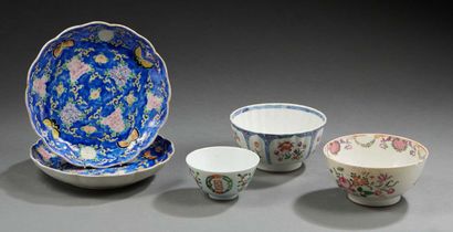 CHINE Set including three bowls and two plates decorated with butterflies on a blue...