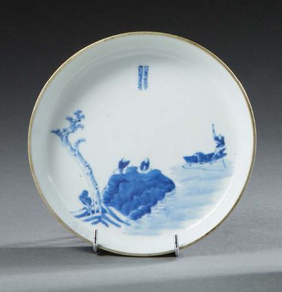 VIETNAM A circular porcelain dish decorated in blue underglaze with characters on...