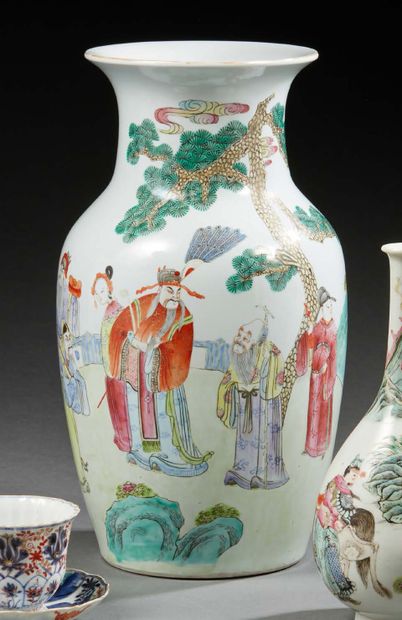 CHINE Porcelain baluster vase decorated in green family enamels with figures.
End...