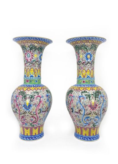 CHINE A pair of baluster-shaped porcelain vases decorated in pink enamels in light...