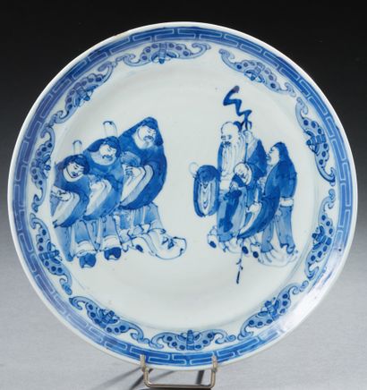 CHINE Circular porcelain plate decorated in blue underglaze with immortals
19th century...