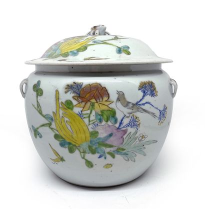 CHINE A circular covered porcelain pot decorated in Famille Rose enamels with digitized...