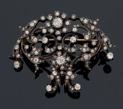 null A silver and silver-gilt jellyfish-shaped brooch decorated with foliage, entirely...