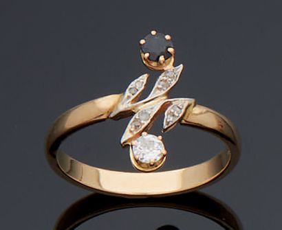 null 
Yellow gold 750 mm and platinum 850 mm ring set with an old cut diamond, a...