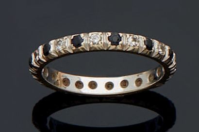 null AMERICAN ALLIANCE alternately set with brilliant-cut diamonds and small round...