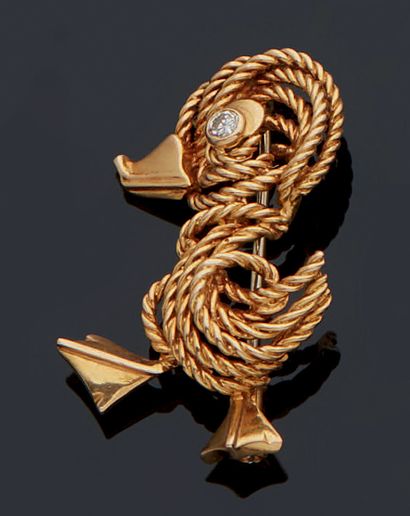 null A yellow gold wire twisted brooch representing a duck, the eye set with a 16/16...