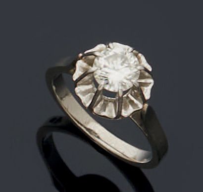 null BAGUE en or gris 750 mm et platine 850 mm ornée d'un diamant brillanté pesant...