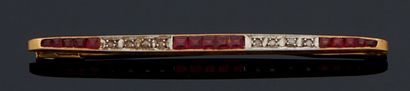 null BARRETTE in yellow gold 750 mm alternately set with lines of calibrated rubies...