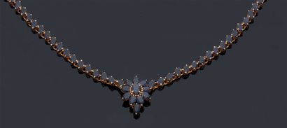 null NECKLACE in gold alloy 585 mm entirely set with small oval sapphires.
Gross...