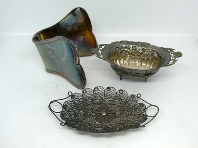 null Set including a silver filigree vacuum pouch, a small cup on feet decorated...