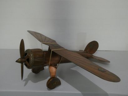 null Ancient copper propeller plane with applied star patterns .

Work of military...
