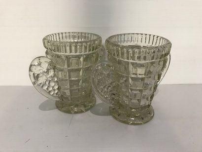 null Pair of moulded pressed glass vases.