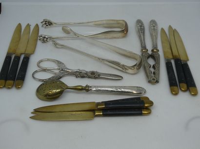 null Set including eight small knives, two sugar tongs, a pair of scissors, a nutcracker,...
