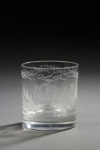 null Small glass with an engraved decoration of branches and a dog asis. Numbered...