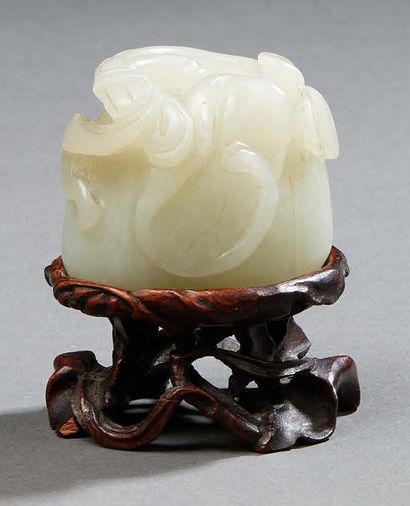 CHINE Beautiful carved jade of light grey-white colour, representing a lotus flower...