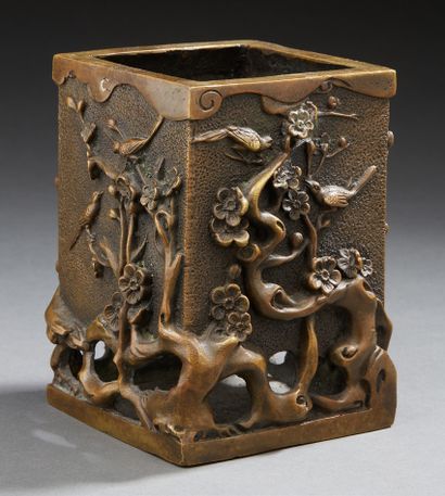 CHINE An openwork bronze quadrangular brush holder, decorated on each side with birds...