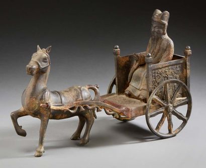 CHINE Celestial funerary chariot in bronze with brown and green patina representing...