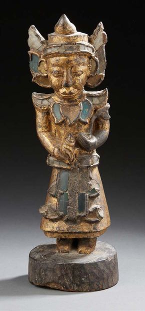 THAÏLANDE Gilded carved wood figurine with mika inlays representing a temple guardian.
Popular...