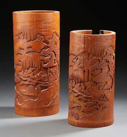 CHINE Two carved bamboo paintbrush holders decorated with scholars and their pagodas...