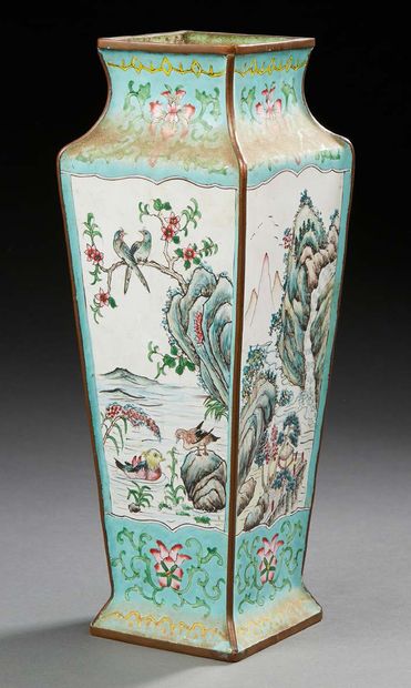 CHINE Enamel vase decorated with mountainous landscapes on a green background.
Canton...