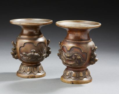 CHINE A pair of small bronze altar vases decorated in light relief with turtles,...