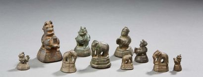 LAOS Ten small bronze weights with brown patina and zoomorphic subjects (elephants,...