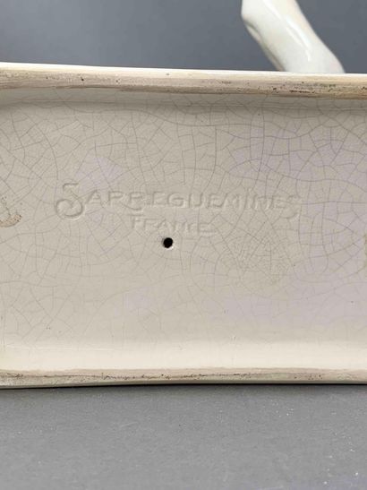 null Manufacture de Sarreguemines 

Sujet en céramique émaillé blanche figurant une...