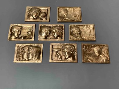 null 
HENRIETTE (1875- 1952) 

Suite de huit plaques en bronze doré : trois à décor...