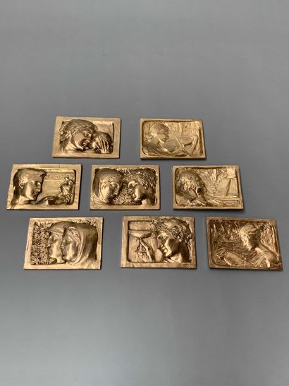 null 
HENRIETTE (1875- 1952) 

Suite de huit plaques en bronze doré : trois à décor...