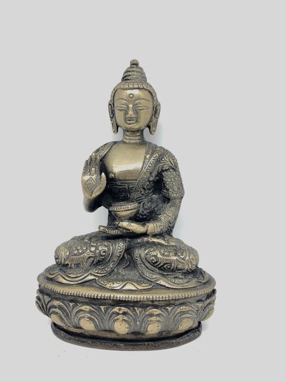 null CHINA


Seated divinity in metal.


H. 21 cm