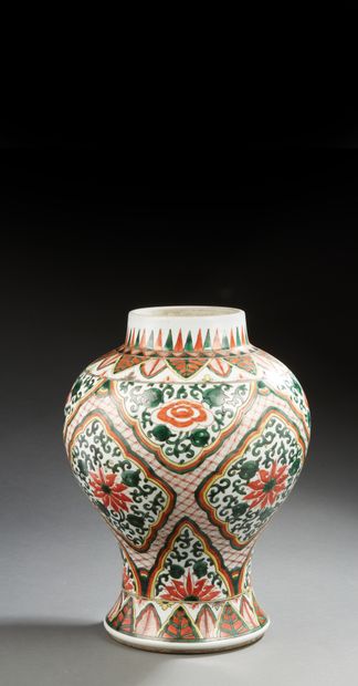 null CHINA 


Porcelain vase of valuster form decorated in wucaî enamels of lotus...