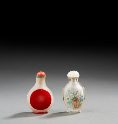 null CHINA


Two snuff bottles, one in glass painted with a landscape, the other...