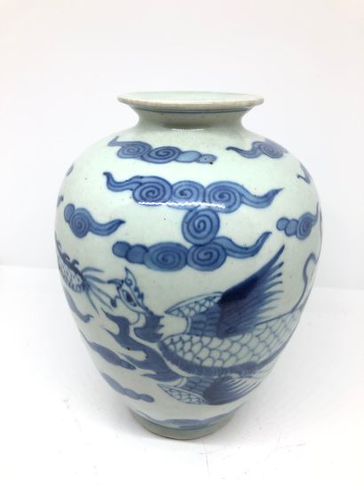 null CHINA - Small ovoid porcelain vase decorated in blue underglaze with a dragon...