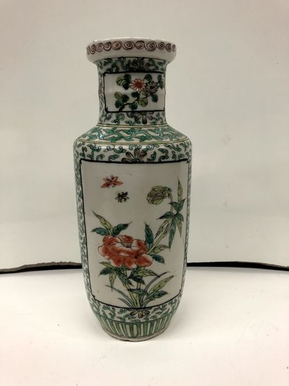 null CHINA 


Enamelled porcelain vase decorated with flowers in enamels of the green...