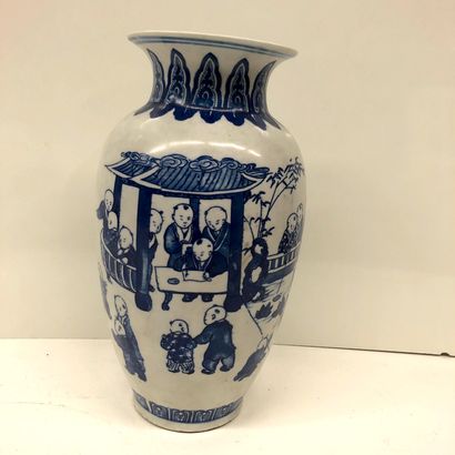 null CHINA


White and blue porcelain vase decorated with children playing in a garden.


Mark...