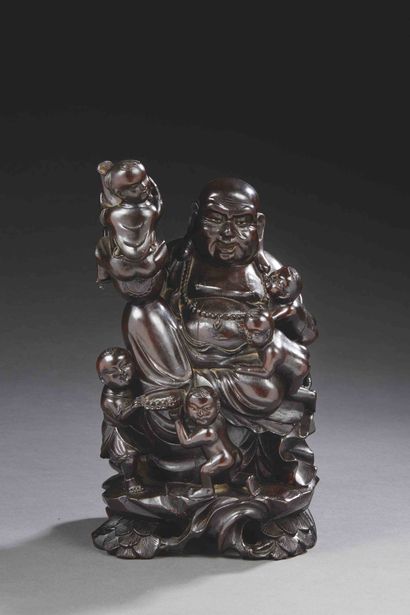 null CHINA


Carved and patinated wood group featuring a laughing buddha and children....