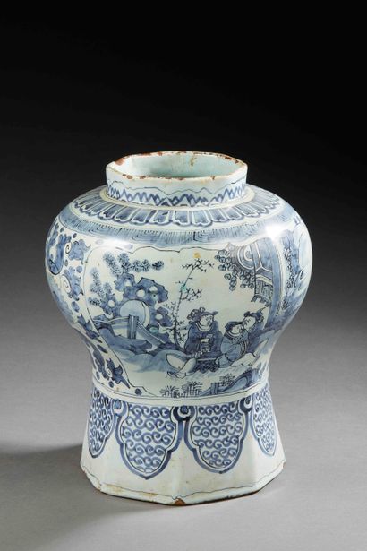 null Earthenware vase with globular body decorated in blue monochrome of reserves...