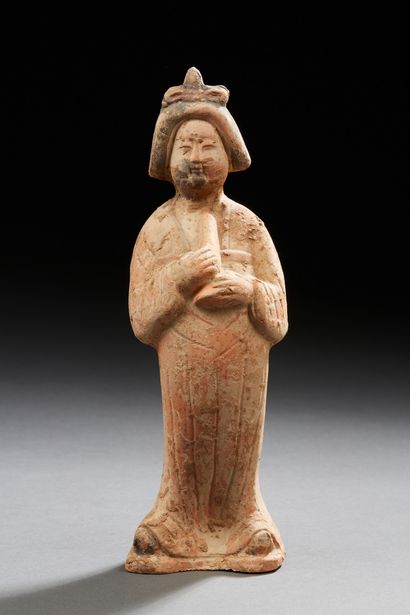 CHINE 
Small terracotta figurine representing a fat lady musician

Probably from...