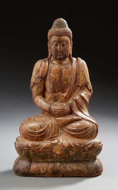CHINE Bouddha en bois laqué et sculpté.
XVIIIe/XIXe siècle.
H.: 32 cm