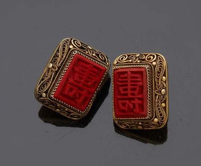 CHINE Pair of filigree silver cufflinks framing greeting characters in imitation...